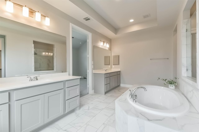 20519 Grazing Foal Ln, Tomball, TX 77377 - full bath with two vanities, a garden tub, marble finish floors, and recessed lighting