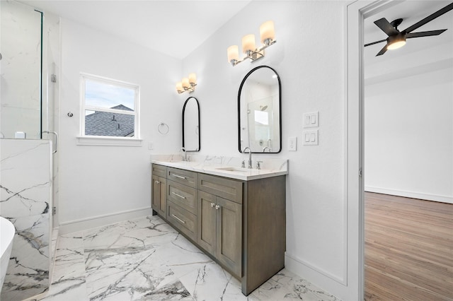 1011 E 28th St, Houston, TX 77009 - full bathroom with double vanity, ceiling fan, a freestanding tub, a marble finish shower, and marble finish flooring