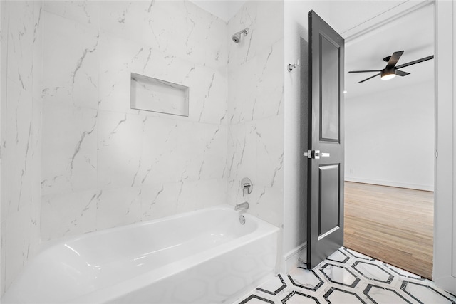 1011 E 28th St, Houston, TX 77009 - bathroom with ceiling fan and tub / shower combination