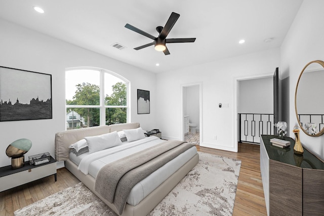 1011 E 28th St, Houston, TX 77009 - bedroom with recessed lighting, light wood-style flooring, a ceiling fan, and ensuite bathroom