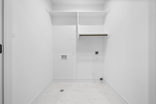 1011 E 28th St, Houston, TX 77009 - washroom with hookup for an electric dryer, marble look tile flooring, and washer hookup