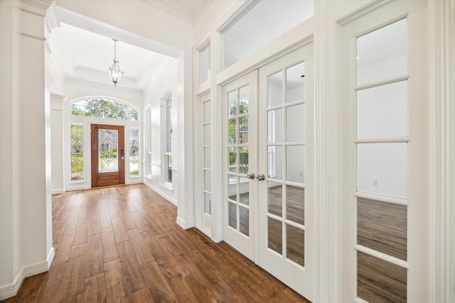 12210 Pebble Mdws, Houston, TX 77041 - entrance foyer with french doors, crown molding, and dark wood-style flooring