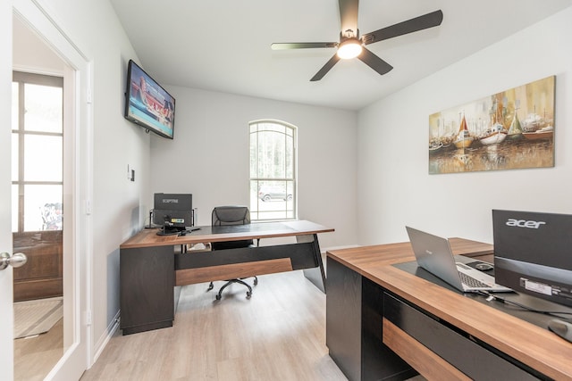 1563 Rd 66114, Dayton, TX 77535 - home office featuring light wood-type flooring, plenty of natural light, and ceiling fan
