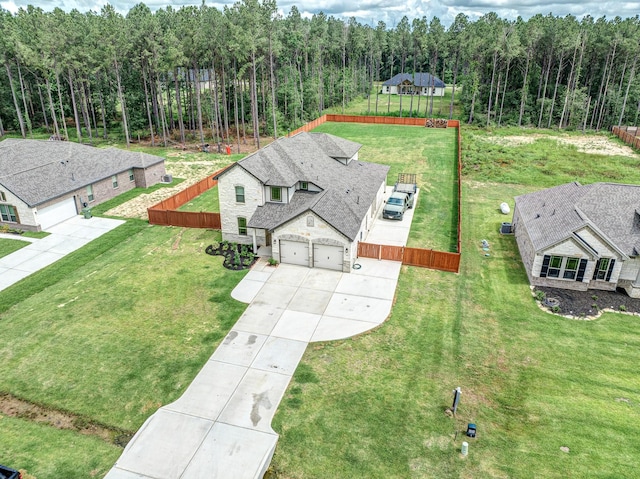 1563 Rd 66114, Dayton, TX 77535 - view of subject property featuring a heavily wooded area