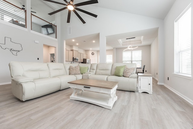 1563 Rd 66114, Dayton, TX 77535 - living room with ceiling fan, light wood-type flooring, and high vaulted ceiling