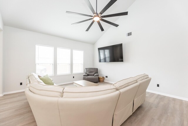 1563 Rd 66114, Dayton, TX 77535 - living room with light wood-type flooring, ceiling fan, and high vaulted ceiling