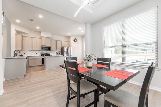 1563 Rd 66114, Dayton, TX 77535 - dining room with light wood-type flooring and recessed lighting