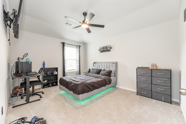 1563 Rd 66114, Dayton, TX 77535 - bedroom featuring light carpet, a ceiling fan, and an office area