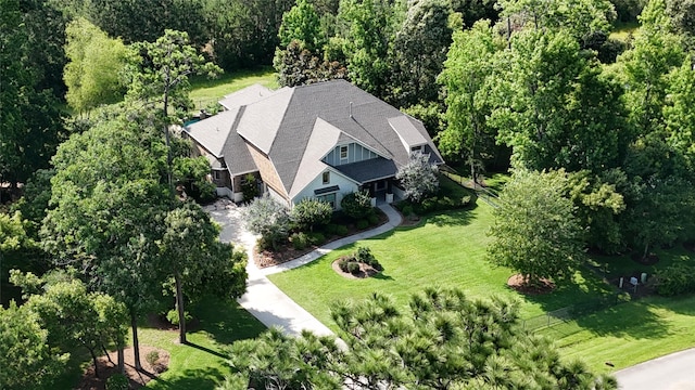 5523 Harvest Oak Landing Dr, Spring, TX 77386 - view from above of property featuring a heavily wooded area