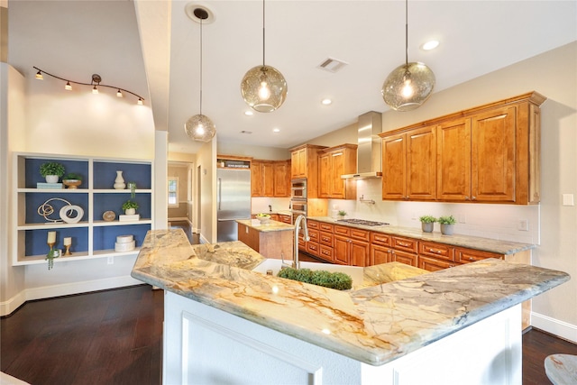 5523 Harvest Oak Landing Dr, Spring, TX 77386 - kitchen featuring wall chimney range hood, stainless steel appliances, a spacious island, brown cabinets, and light stone counters