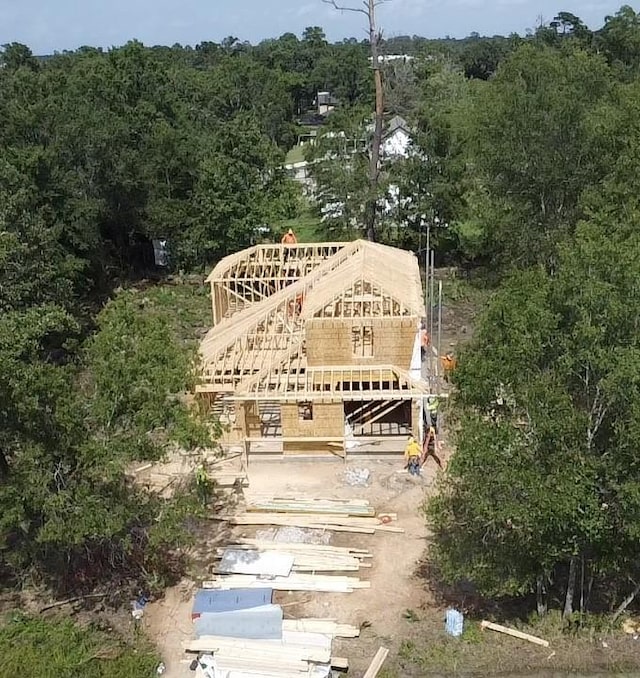 TBC/ Spindle Oaks, Conroe, TX 77385 - view of subject property featuring a forest