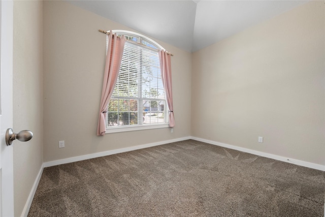16711 Ramsay Cascades Dr, Humble, TX 77346 - carpeted spare room featuring baseboards and vaulted ceiling