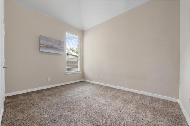 16711 Ramsay Cascades Dr, Humble, TX 77346 - carpeted empty room featuring baseboards and vaulted ceiling