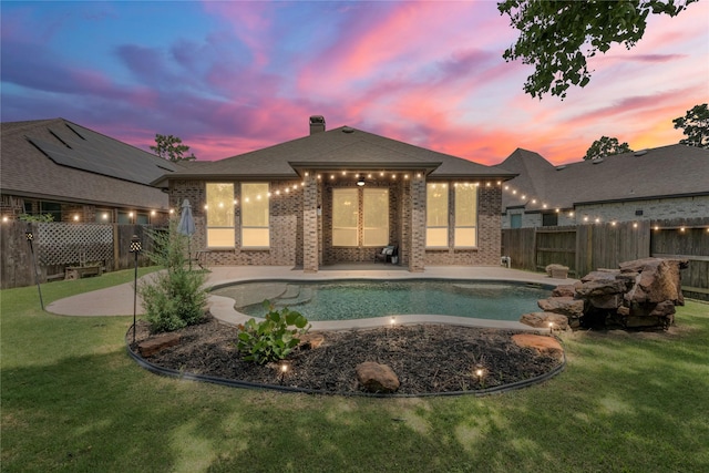 16711 Ramsay Cascades Dr, Humble, TX 77346 - rear view of property with brick siding, a patio, a fenced backyard, and a chimney