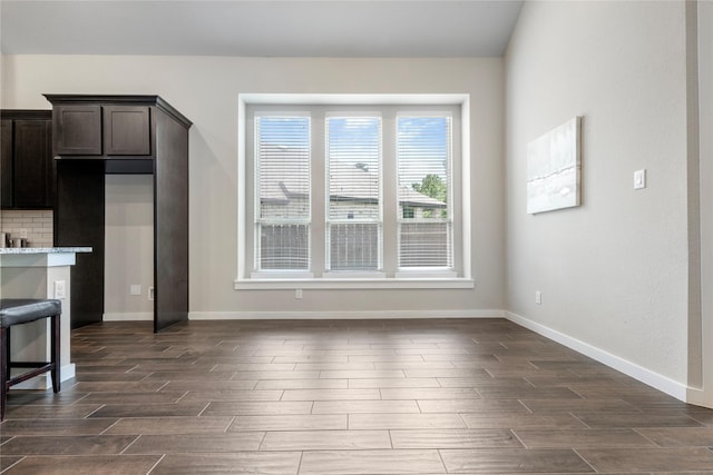 16711 Ramsay Cascades Dr, Humble, TX 77346 - kitchen featuring wood finish floors and dark brown cabinetry