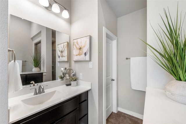 16711 Ramsay Cascades Dr, Humble, TX 77346 - bathroom featuring vanity and tile patterned flooring