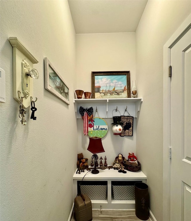 147 Castlegate Ln, Jersey Village, TX 77065 - mudroom featuring wood finished floors and baseboards
