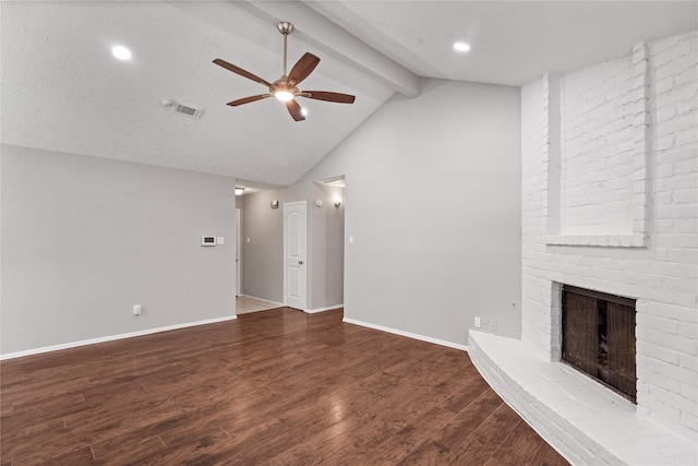 2031 Oakwell Ln, Katy, TX 77449 - unfurnished living room featuring ceiling fan, a fireplace, and wood finished floors