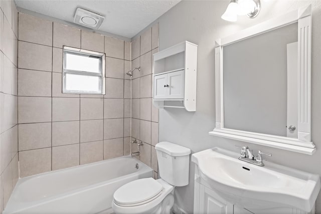 2031 Oakwell Ln, Katy, TX 77449 - full bath with vanity, shower / tub combination, and a textured ceiling