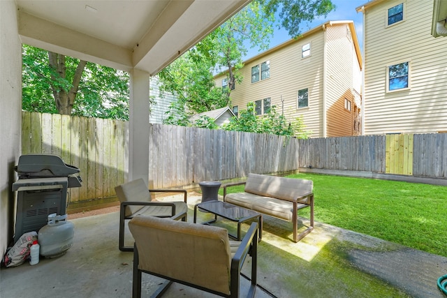 5204 Maxie St, Houston, TX 77007 - fenced backyard with a patio area, a grill, and an outdoor living space