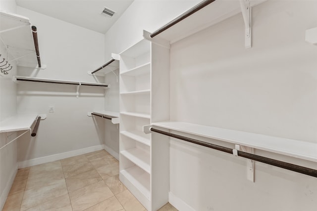 5204 Maxie St, Houston, TX 77007 - spacious closet featuring light tile patterned flooring