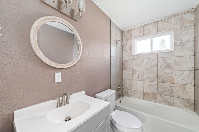 9333 Fairland Dr, Houston, TX 77051 - bathroom featuring a textured wall, shower / bath combination, vanity, and a textured ceiling