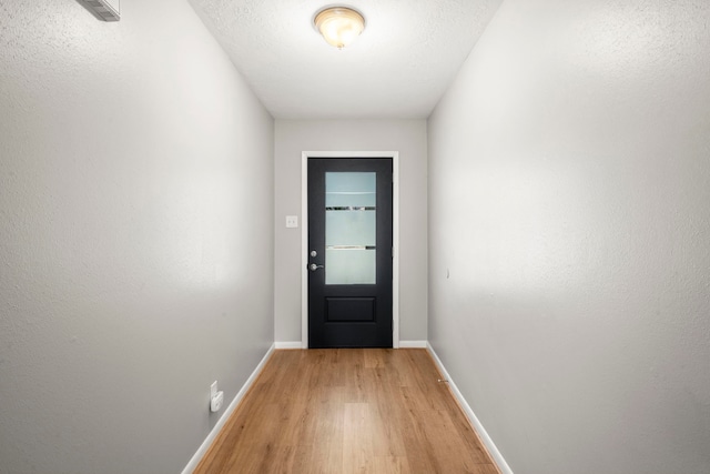 14902 Forest Lodge Dr, Houston, TX 77070 - entryway featuring light wood-style floors and baseboards