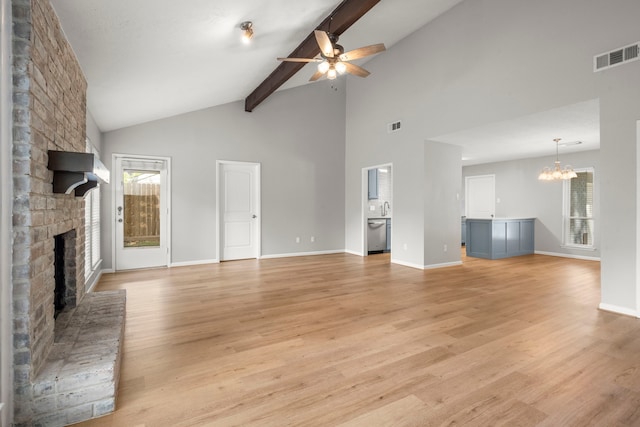 14902 Forest Lodge Dr, Houston, TX 77070 - unfurnished living room with a fireplace, a ceiling fan, a chandelier, healthy amount of natural light, and beamed ceiling