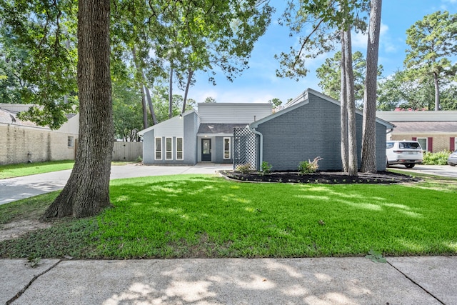 14902 Forest Lodge Dr, Houston, TX 77070 - mid-century home with brick siding