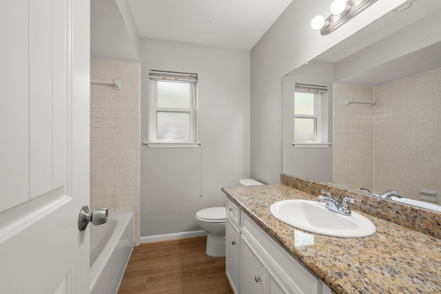 14902 Forest Lodge Dr, Houston, TX 77070 - full bathroom with vanity, wood finished floors, and bathing tub / shower combination