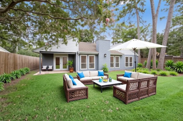 14902 Forest Lodge Dr, Houston, TX 77070 - rear view of property with a chimney, french doors, outdoor lounge area, and a fenced backyard