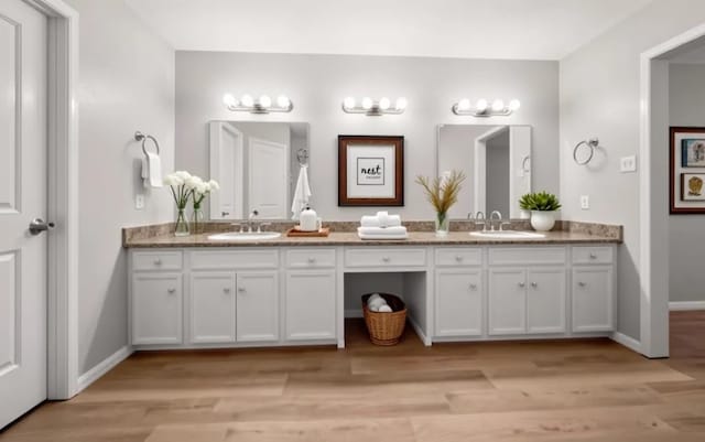 14902 Forest Lodge Dr, Houston, TX 77070 - full bath with double vanity and wood finished floors