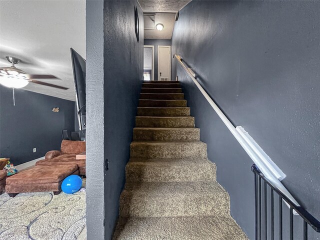 3412 Lantern Ln, Baytown, TX 77521 - staircase with ceiling fan