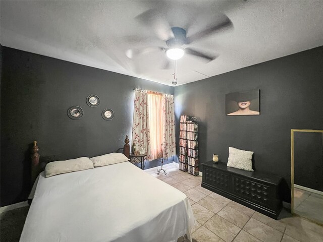 3412 Lantern Ln, Baytown, TX 77521 - bedroom with tile patterned flooring and ceiling fan