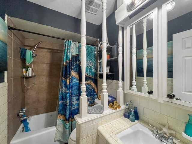3412 Lantern Ln, Baytown, TX 77521 - full bathroom with backsplash, shower / tub combo, and vanity