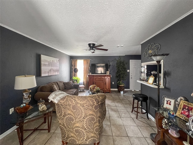 3412 Lantern Ln, Baytown, TX 77521 - living room with ceiling fan, light tile patterned floors, a textured ceiling, and crown molding