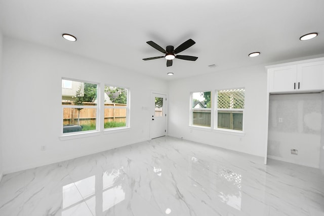 8023 Brandon St, Houston, TX 77051 - unfurnished living room featuring a ceiling fan, light marble finish floors, and recessed lighting