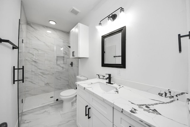 8023 Brandon St, Houston, TX 77051 - bathroom featuring marble look tile flooring, vanity, and a marble finish shower