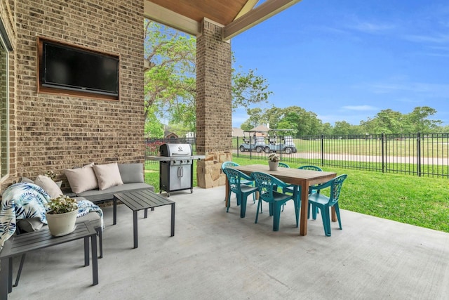 97 La Costa Dr, Montgomery, TX 77356 - fenced backyard featuring area for grilling, outdoor dining space, a patio, and outdoor lounge area