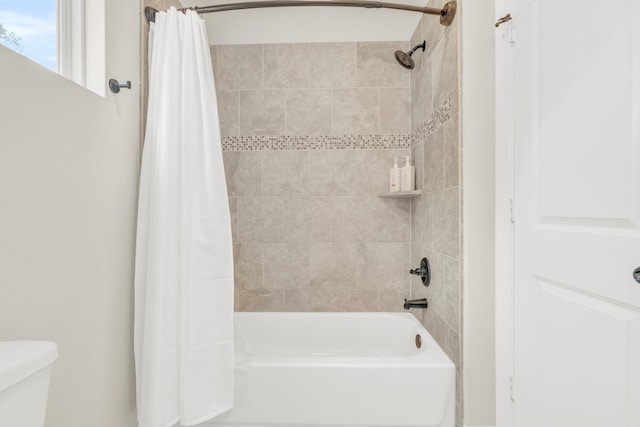 97 La Costa Dr, Montgomery, TX 77356 - bathroom featuring shower / tub combo with curtain and toilet