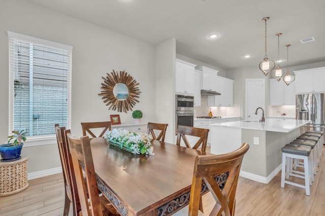 97 La Costa Dr, Montgomery, TX 77356 - dining room featuring light wood-style flooring and recessed lighting