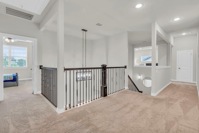 97 La Costa Dr, Montgomery, TX 77356 - hall featuring carpet, an upstairs landing, and recessed lighting