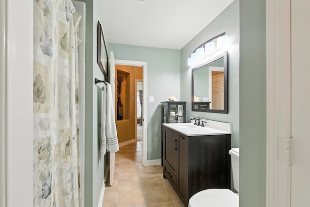 11506 Amber Canyon Dr, Houston, TX 77095 - bathroom featuring vanity, tile patterned floors, and curtained shower