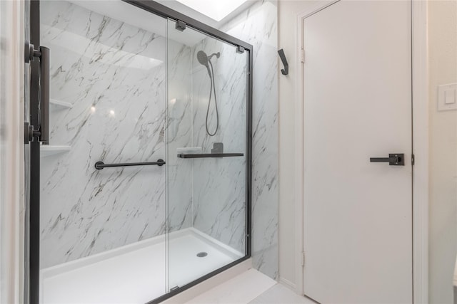 9850 Pagewood Ln Unit 909, Houston, TX 77042 - bathroom with a marble finish shower