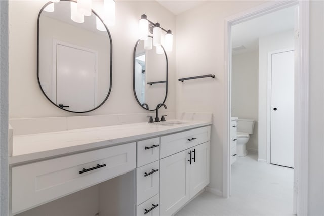 9850 Pagewood Ln Unit 909, Houston, TX 77042 - bathroom with toilet and vanity