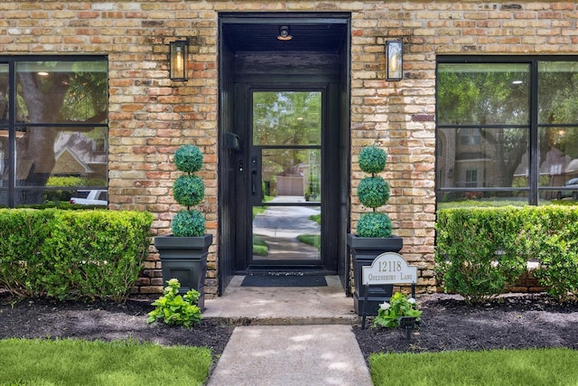 12118 Queensbury Ln, Houston, TX 77024 - property entrance with brick siding