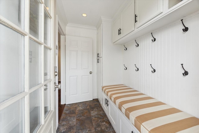 12118 Queensbury Ln, Houston, TX 77024 - mudroom featuring stone finish floors and ornamental molding