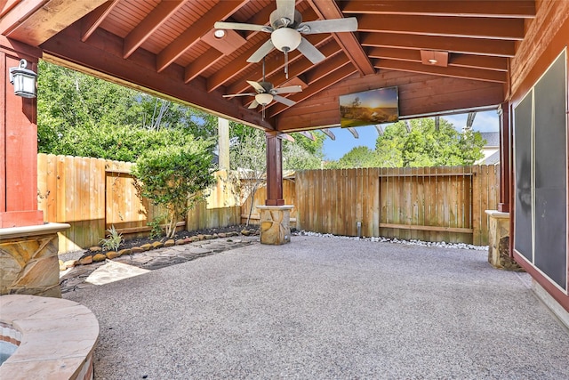 7127 Vermejo Park Ln, Humble, TX 77346 - fenced backyard with a patio area and a ceiling fan