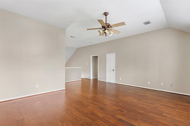 7127 Vermejo Park Ln, Humble, TX 77346 - unfurnished living room featuring vaulted ceiling, ceiling fan, and wood finished floors