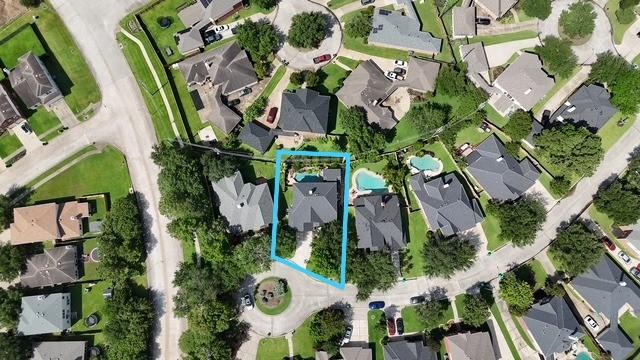 7127 Vermejo Park Ln, Humble, TX 77346 - aerial perspective of suburban area with property parcel outlined